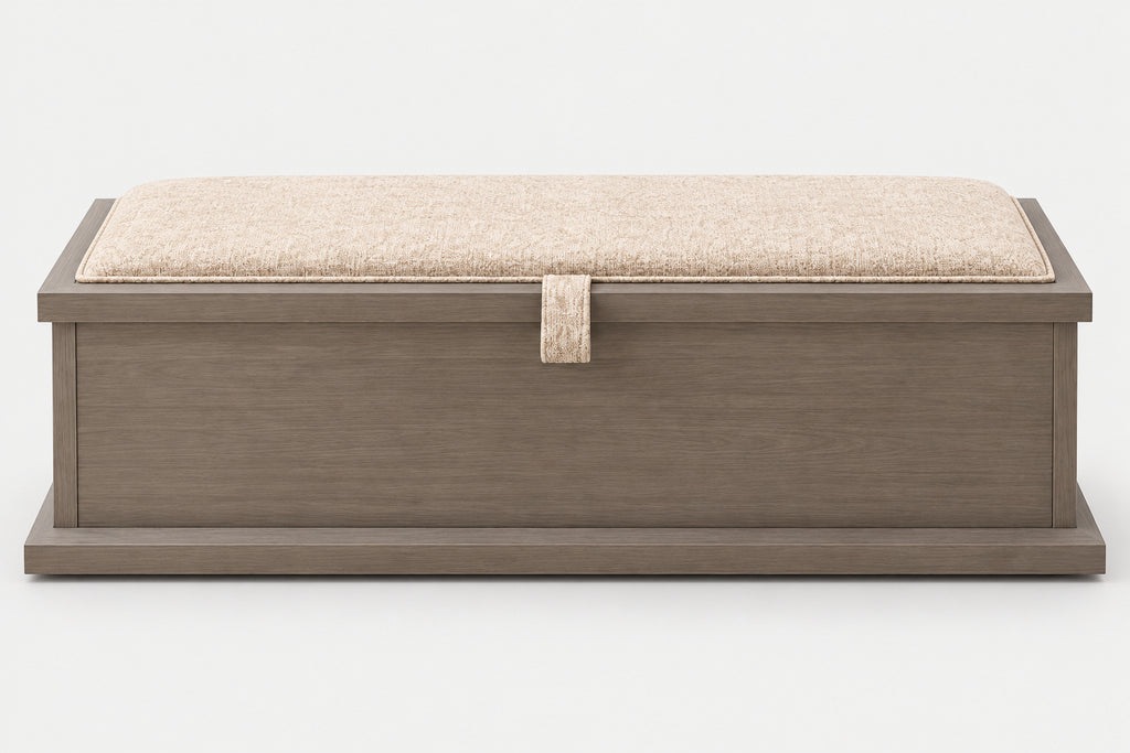 A rectangular storage bench with a medium brown wood-grain finish and a beige textured fabric cushion on top, featuring a small matching fabric pull tab on the front.