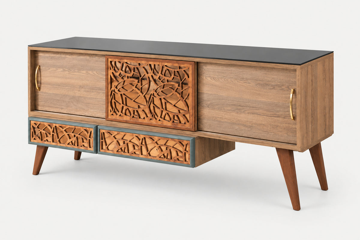 Mid-century modern wooden sideboard cabinet with carved wood details, a black top surface, and tapered legs, shown on a light gray background.