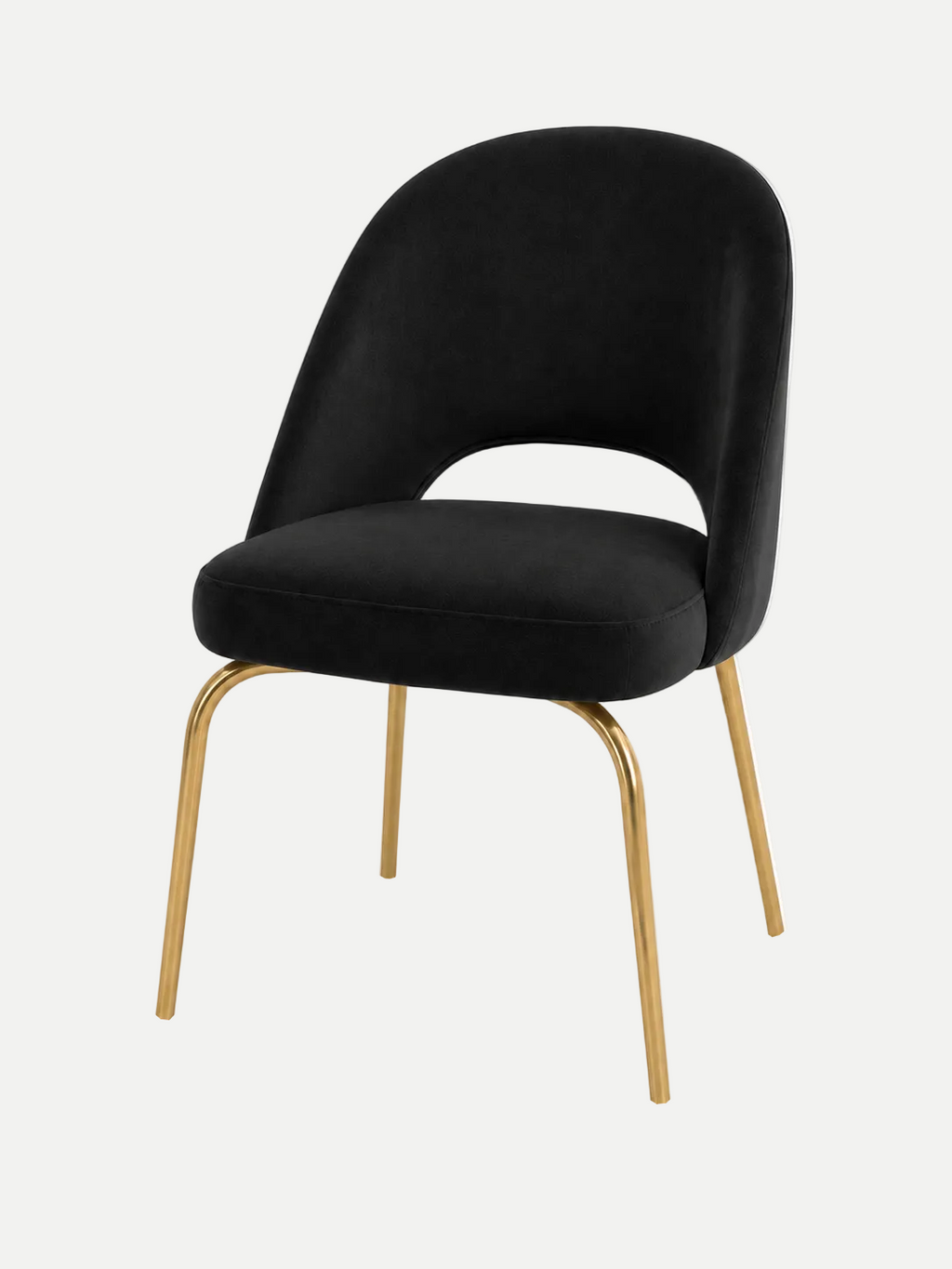 A modern dining chair with a black velvet upholstered seat and curved backrest, supported by slim gold metal legs, shown against a plain white background.