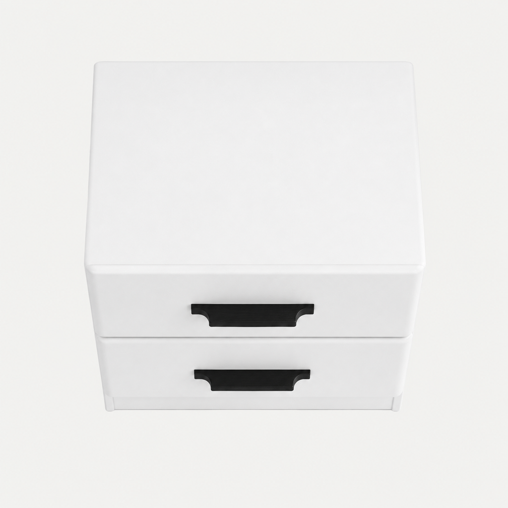 A small white two-drawer nightstand or storage cabinet with black pull handles, photographed on a clean light gray background.