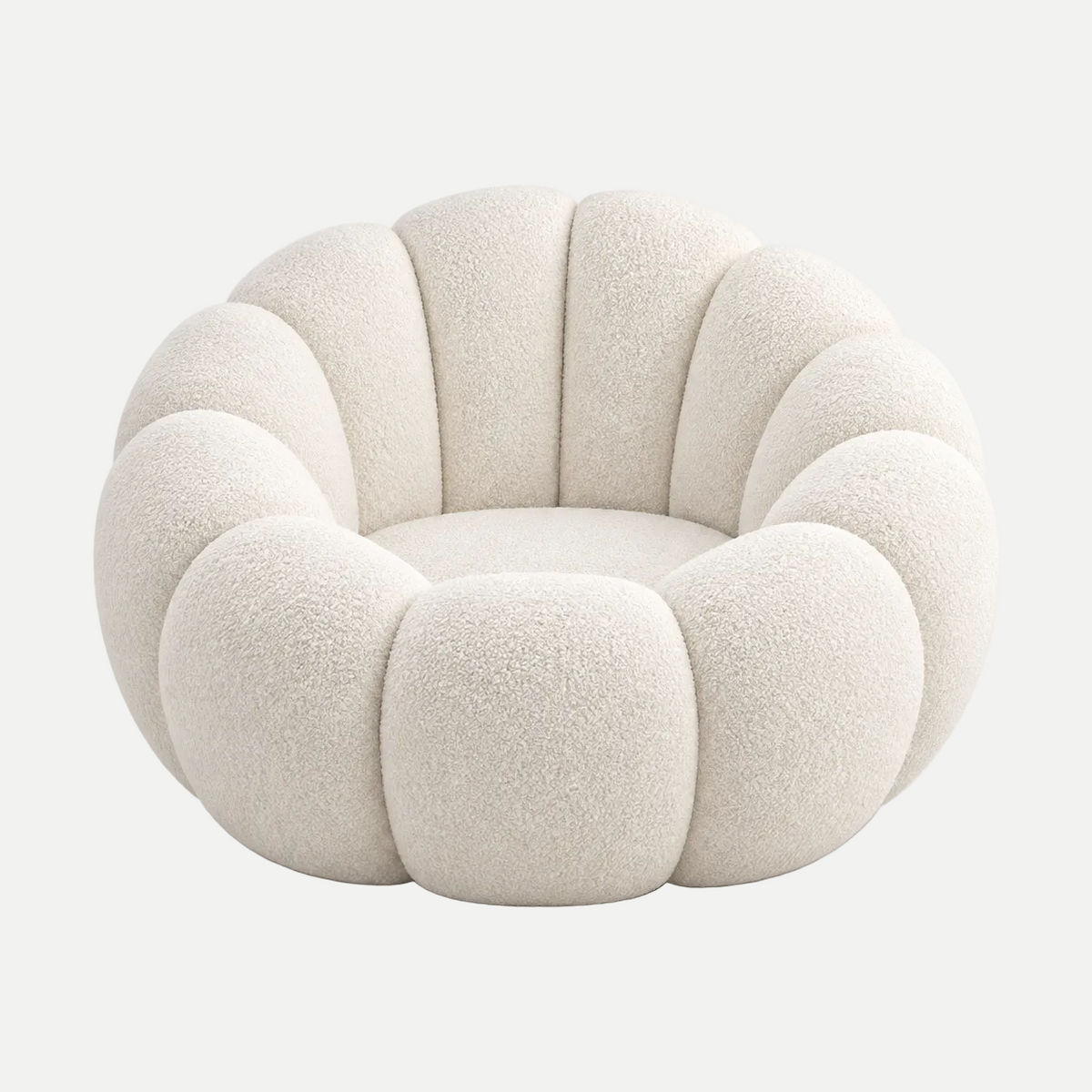 A modern, round, flower-petal shaped pouf chair upholstered in a textured cream bouclé fabric, set against a clean, light gray studio background.