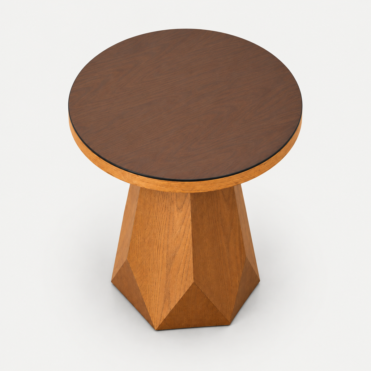 A modern side table with a round dark brown wood top and a faceted geometric pedestal base in a warm medium brown wood finish, shown on a light gray background.