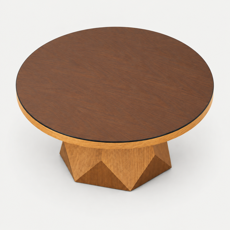 A round wooden coffee table with a dark brown top and a geometric faceted pedestal base in a lighter natural wood tone, shown on a clean white background.