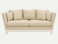 A beige upholstered italian couch with four matching back cushions and a carved white base, shown against a plain light gray studio background.