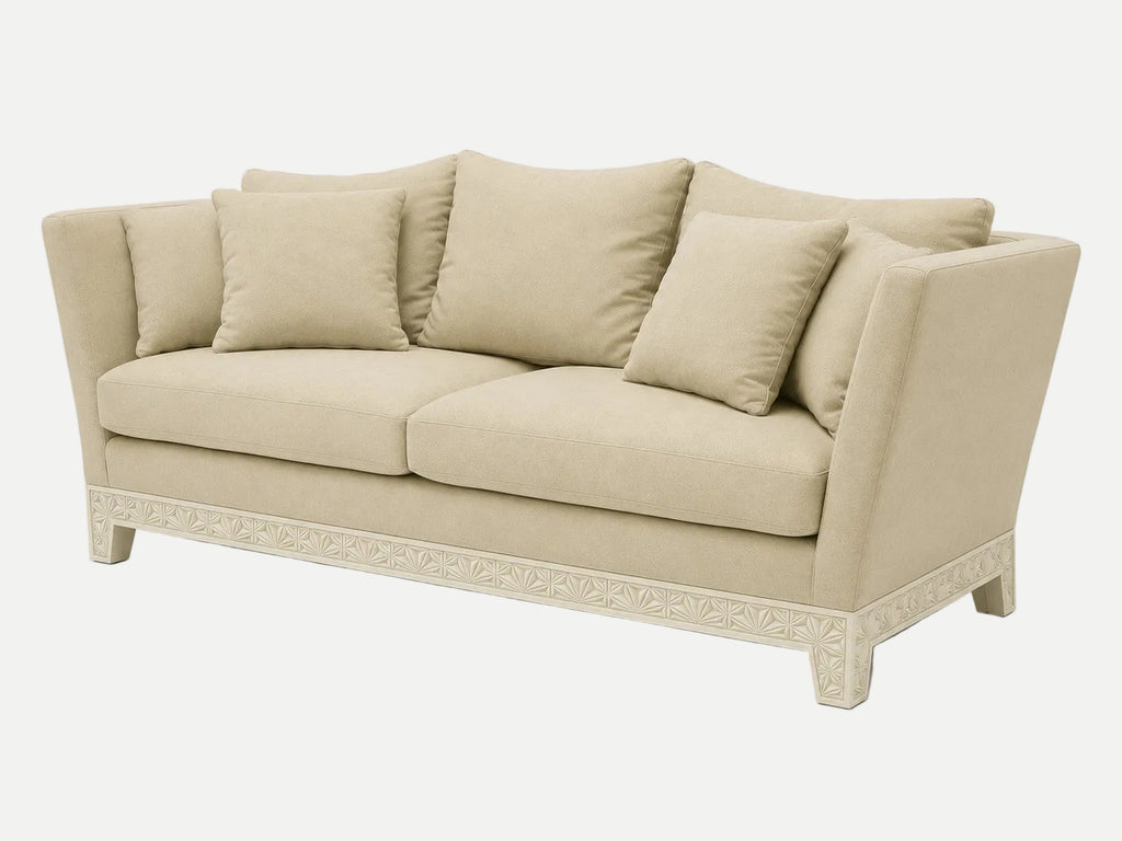 A beige upholstered Italian couch with matching back and seat cushions, shown at a three-quarter angle on a light gray studio background.