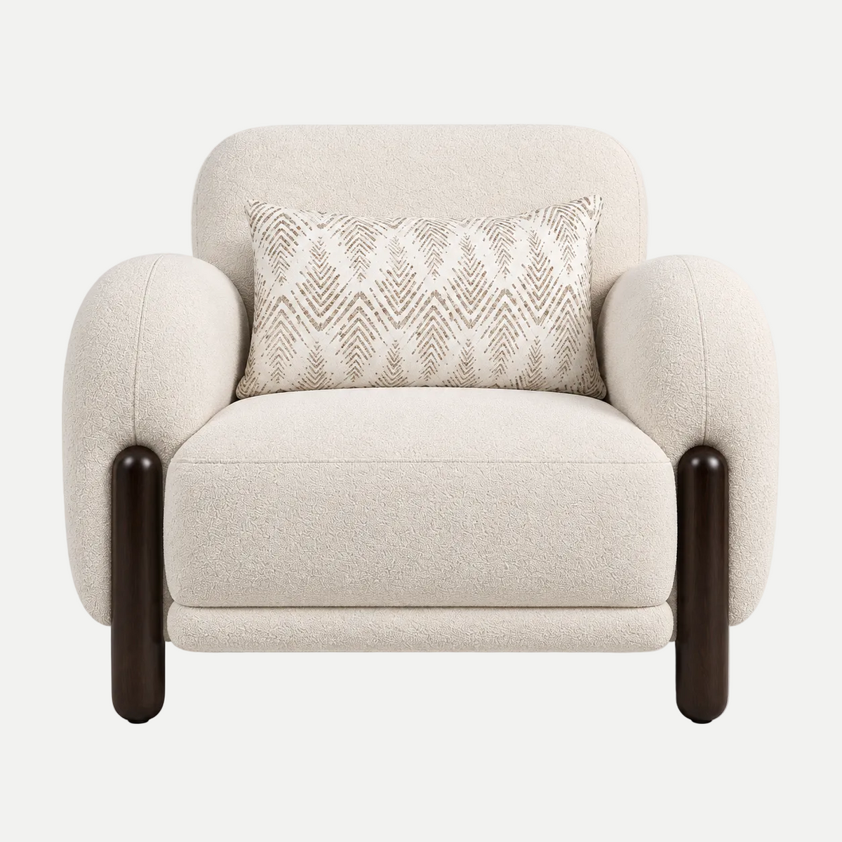 A modern upholstered accent chair in a textured cream bouclé fabric, featuring dark brown wooden legs and a matching cream throw pillow with a beige geometric pattern, set against a plain light gray background.