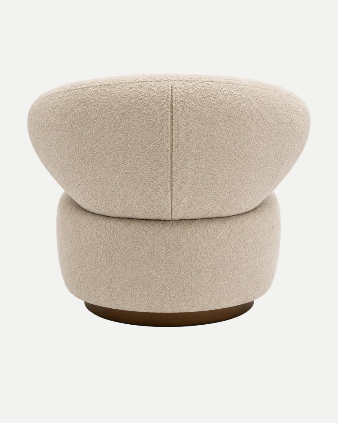 A modern curved back chair upholstered in a textured bouclé fabric in a warm beige color, featuring a circular wooden base.