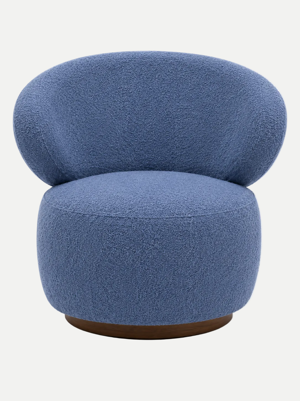 A modern round lounge chair upholstered in textured blue bouclé fabric, featuring a rounded backrest and a low wooden base, shown against a plain white background.