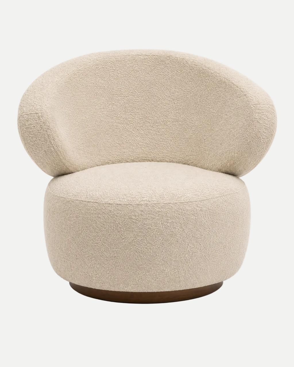 A modern round lounge chair upholstered in a textured cream bouclé fabric, featuring a low rounded backrest and a dark brown wooden base, shown against a plain white background.
