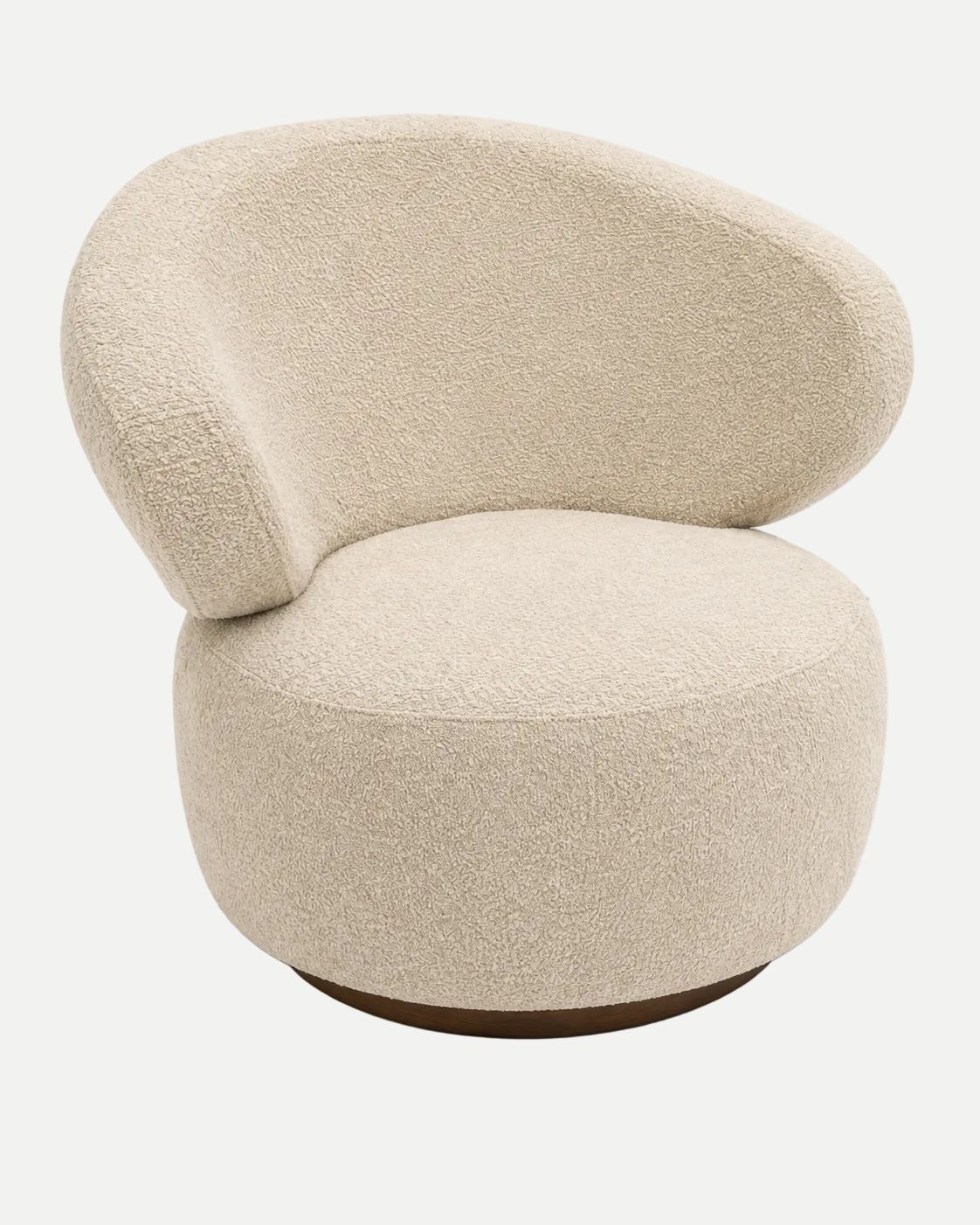A modern, rounded boucle armchair in a warm cream or beige fabric, featuring a low, wide backrest and a circular base with a dark wood-look foot, shown on a plain white background.