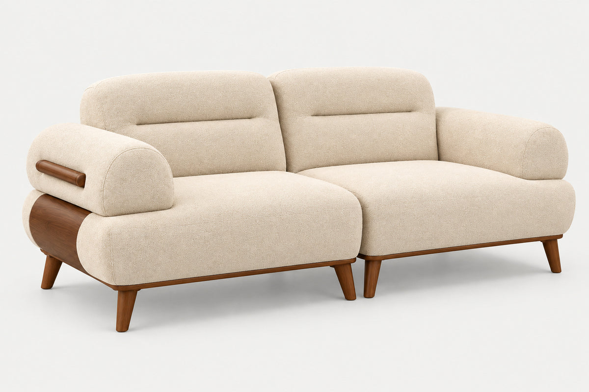 A modern two-seater sofa with cream-colored textured upholstery and medium brown wooden legs and side accents, shown on a light gray studio background.
