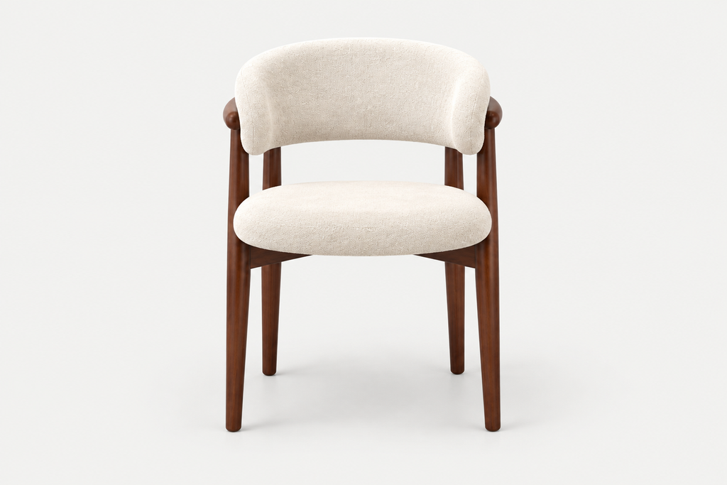A modern accent chair with a curved cream upholstered backrest and seat, supported by a dark brown wooden frame with tapered legs, shown against a light gray background.