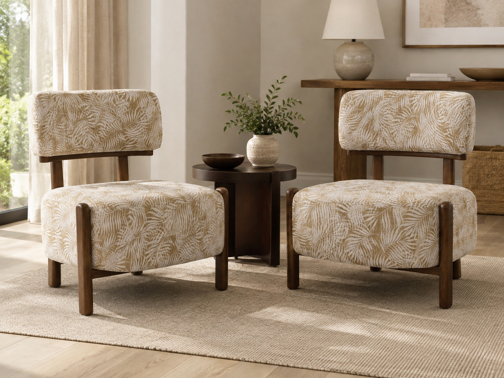 Two upholstered accent chairs with matching ottomans in a beige and white palm leaf pattern, set in a bright, modern living room with a small wooden side table between them. Eleraky Furniture