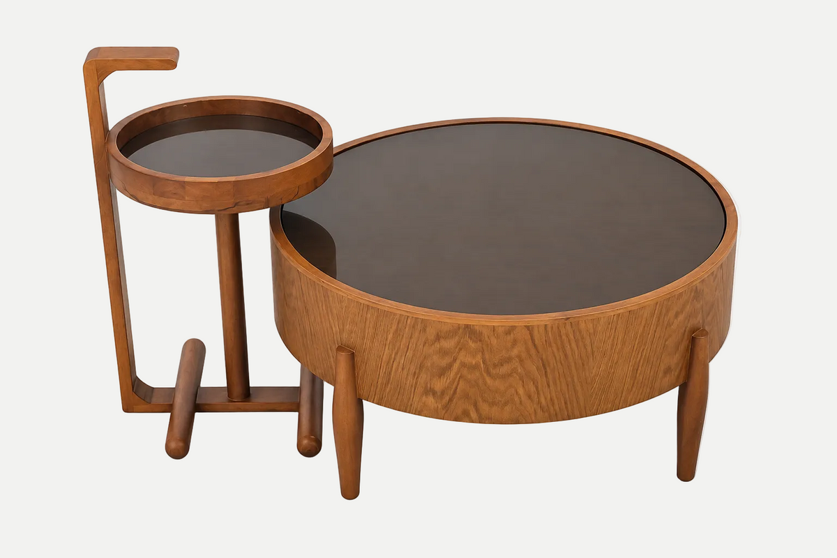 A mid-century modern wooden nesting coffee table set with a larger round table and a smaller matching side table, both featuring dark brown circular tops and warm medium-brown wood grain.
