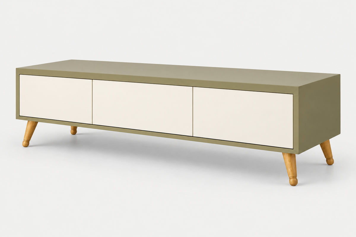 A modern long sideboard or media console with a sage green frame, three cream-colored front doors, and light wood legs, shown on a light gray background.