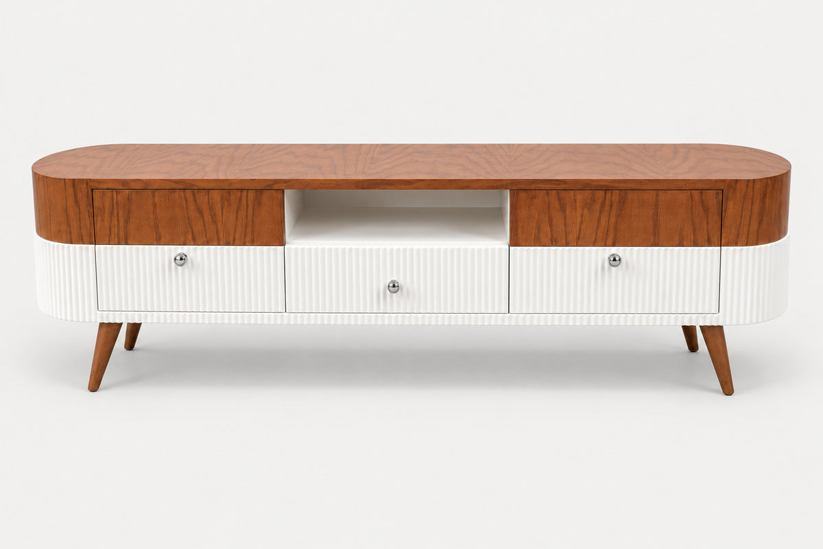 A mid-century modern TV stand or console cabinet with a curved top, featuring a warm brown wood grain finish on the top and drawer fronts, and a white ribbed lower cabinet body with tapered wooden legs.